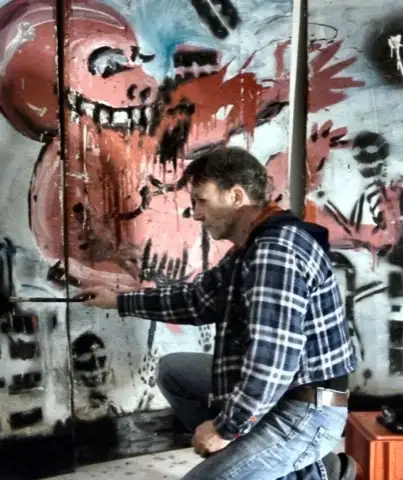 Pete O'Donald working on a painting in his studio